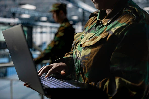Soldier using laptop